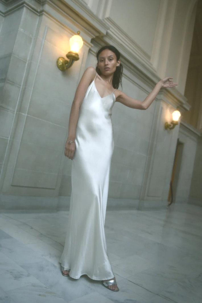 woman wearing white slip dress