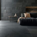 living room in dark colours with floor or slate tiles